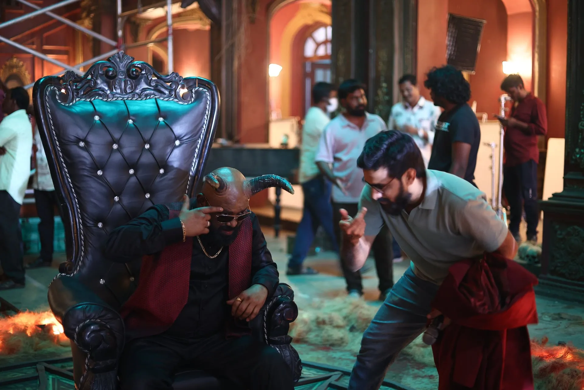Arun Raja Kamaraj in the devil look on set with director Pushpanathan Arumugam