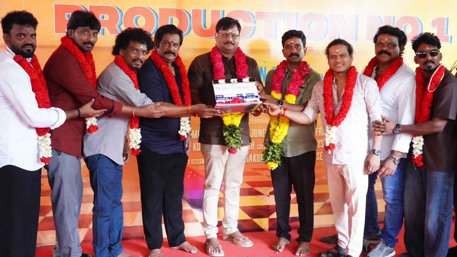 The Production No 1 team gives the ceremonial first clap at the pooja in Chennai