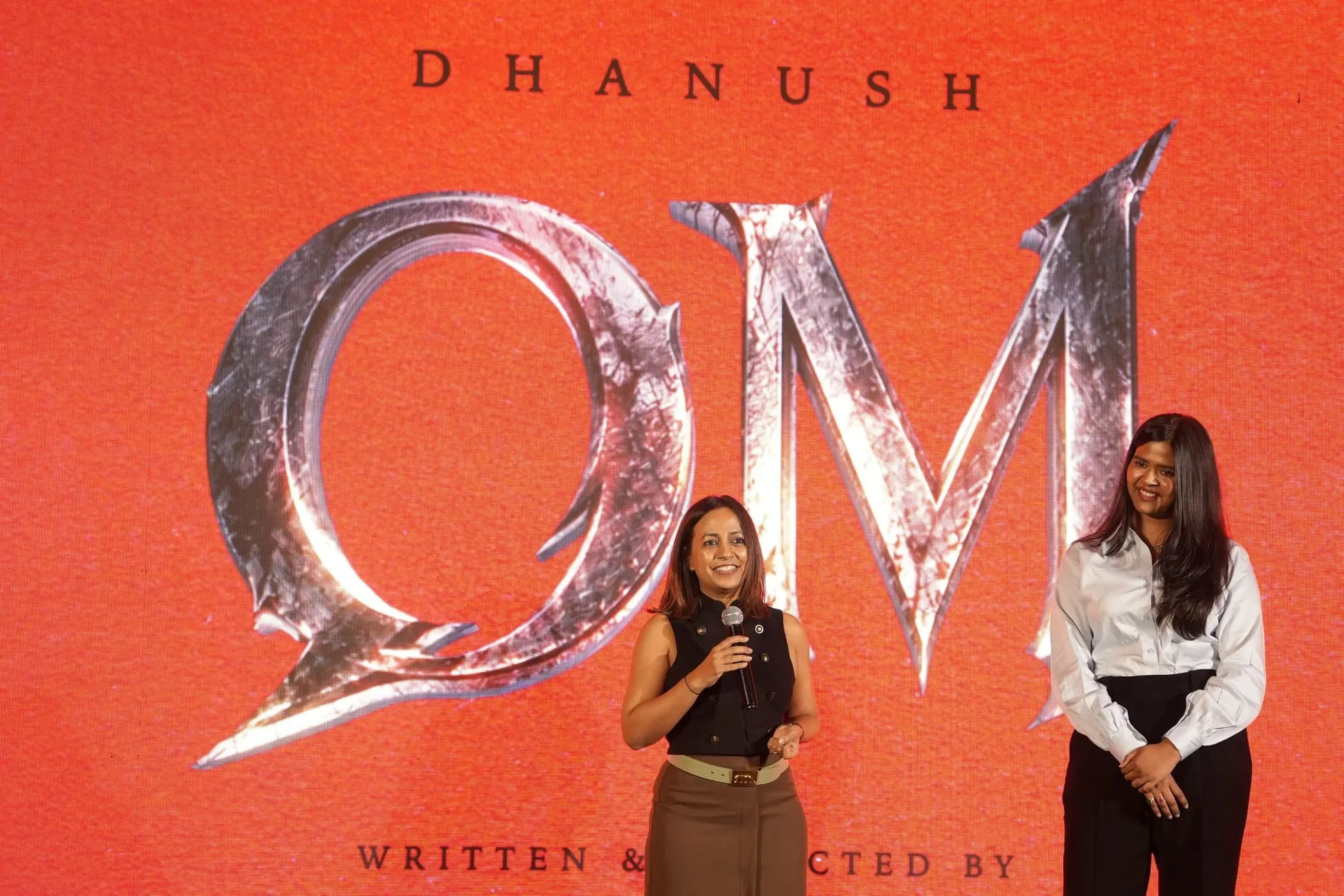 The OM title revealed on the LED backdrop at the D55 title announcement event