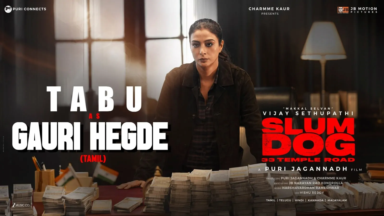 Tabu as Gauri Hegde standing over a desk stacked with seized cash in Slum Dog 33 Temple Road