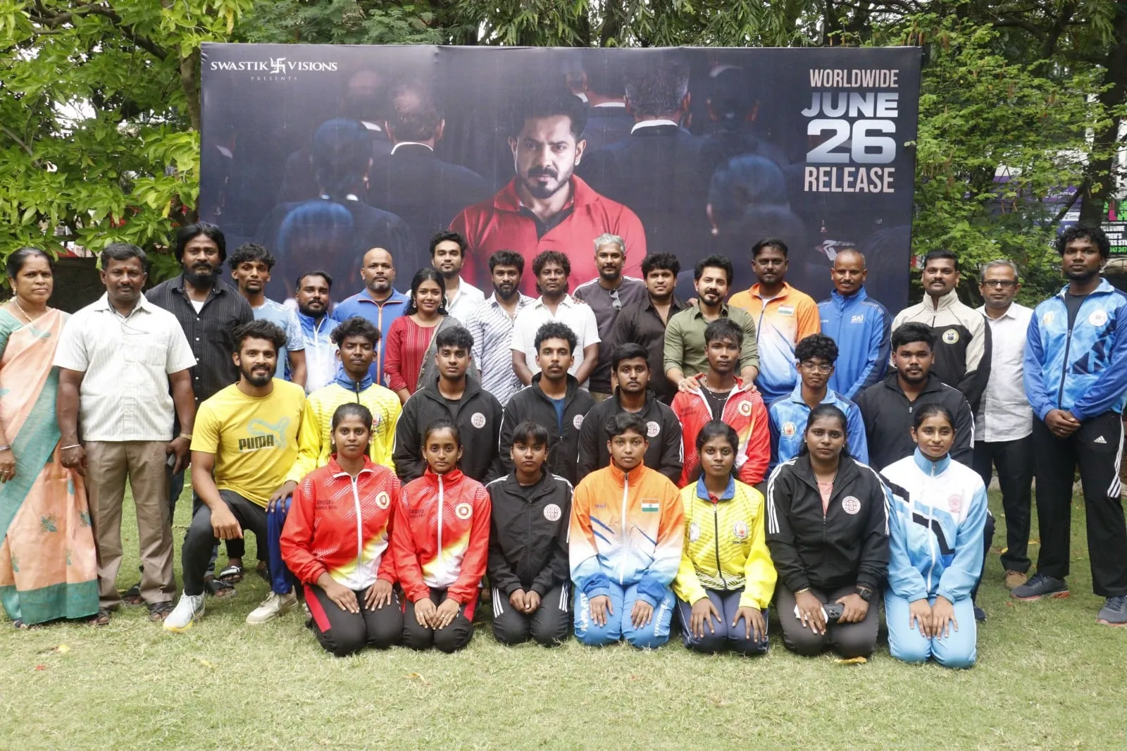 KJR poses outdoors with young athletes ahead of Angikaaram's release