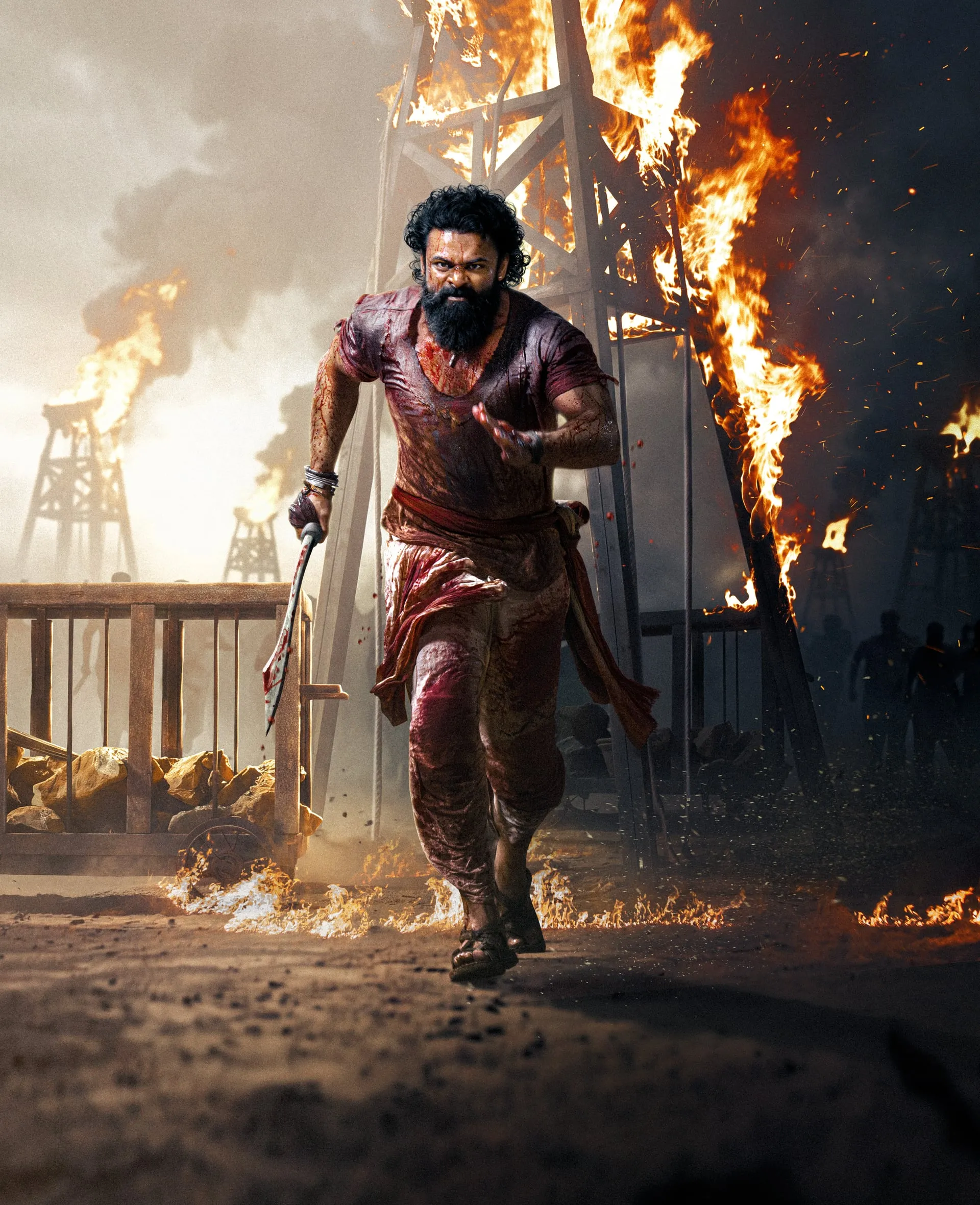 Sai Durgha Tej runs past burning oil derricks with a blade in hand in the Sambarala Yeti Gattu wrap poster