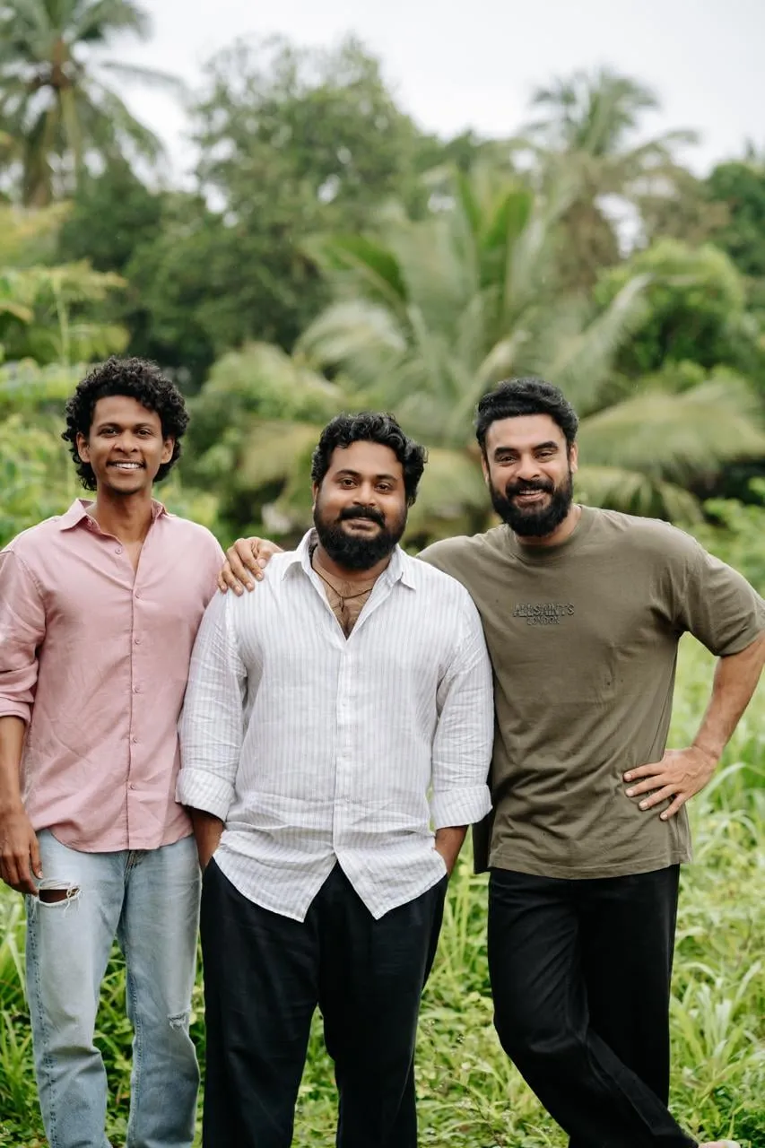 Chethan Jayalal, Johnpaul George and Tovino Thomas photographed together for the Guppy anniversary reunion