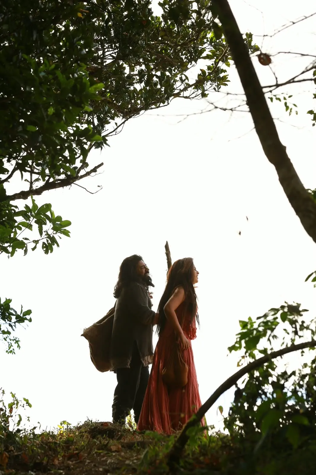 Nivin Pauly and Anjali on a forested ridge, one of the stretches where the film opens up