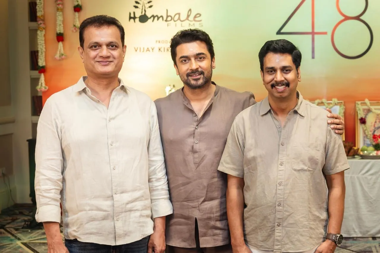 Suriya with the producers of Suriya 48 at the launch