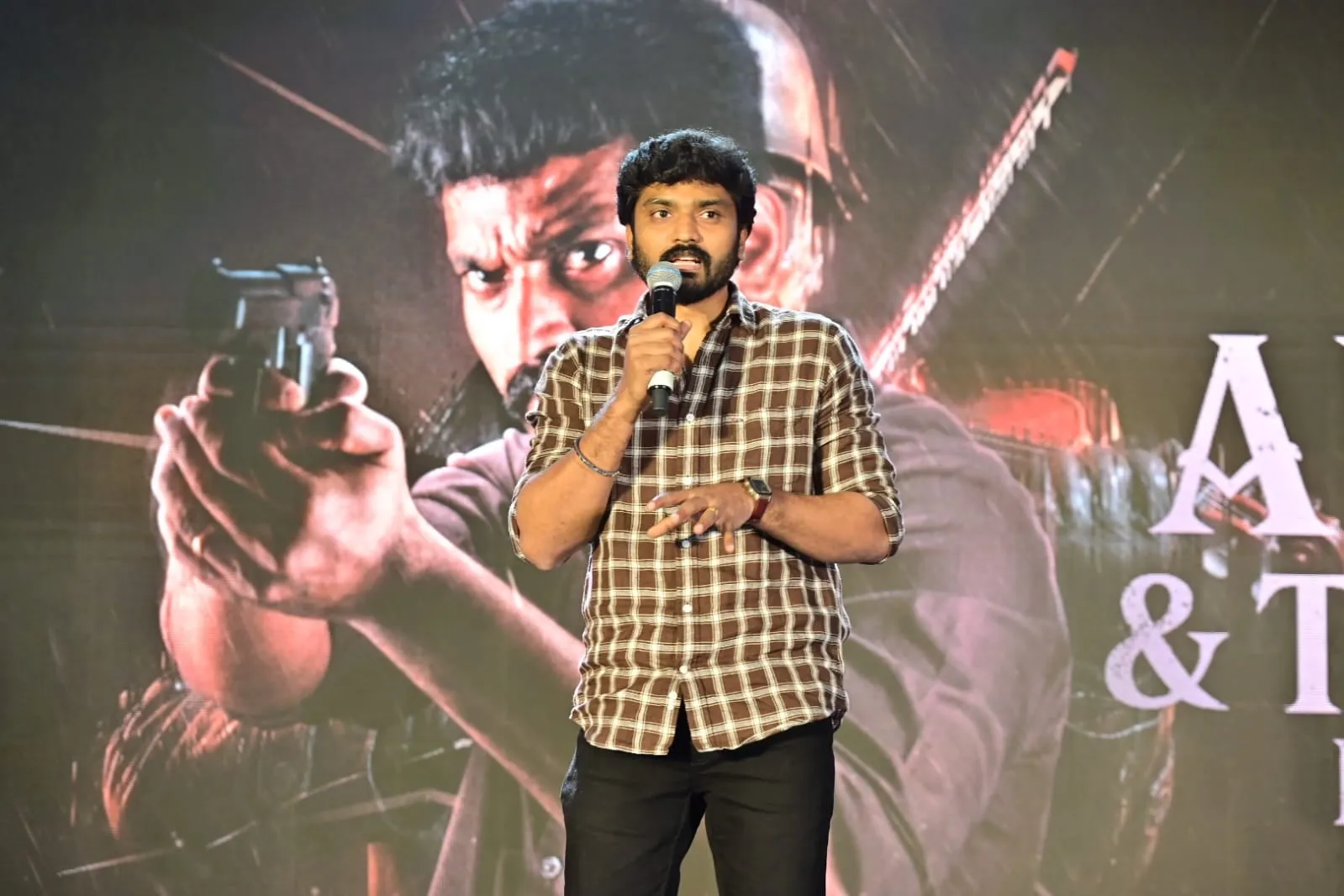 A speaker addresses the gathering at the The Dark Heaven trailer launch