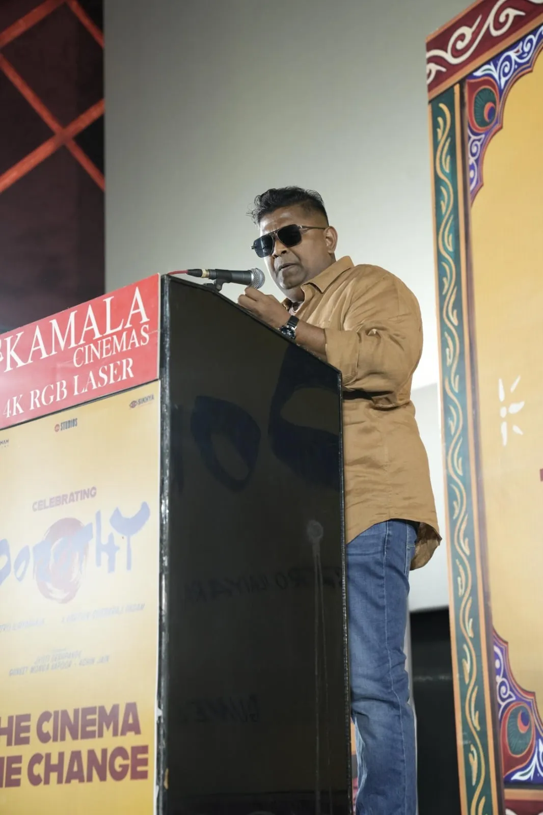 A speaker at the podium during the Dorothy thanksgiving event